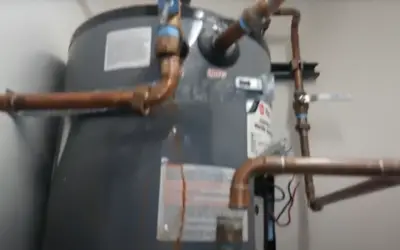 An old water heater that needs to be replaced.