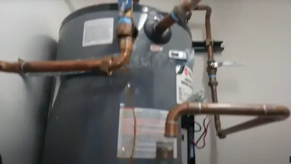 An old water heater that needs to be replaced.