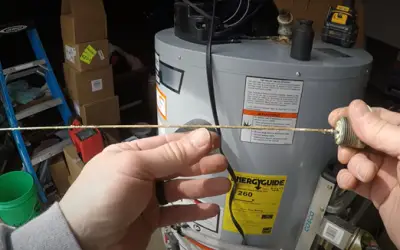 Is your water heater too old? Check the anode rod. Worn out annode rod caused the water heater tank to leak.